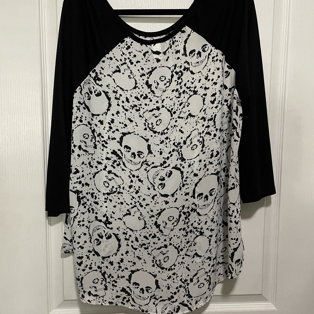 Quarter sleeve blouse.